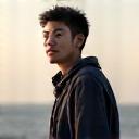 Porträtfoto von David Chen.